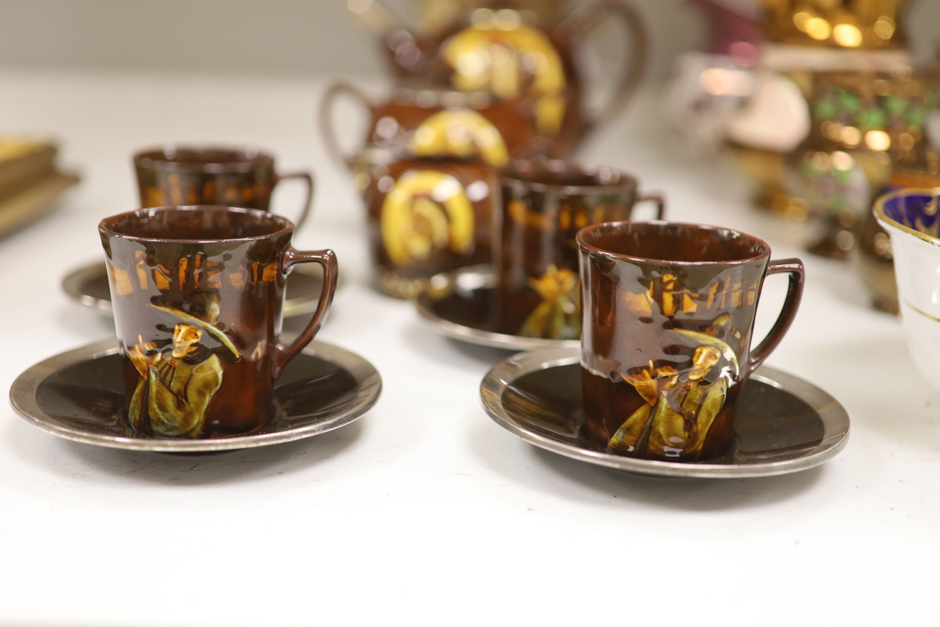 A Royal Doulton silver mounted Hearts Content tea service, and a Doulton Japanese inspired silver mounted jug, assorted lustre jugs